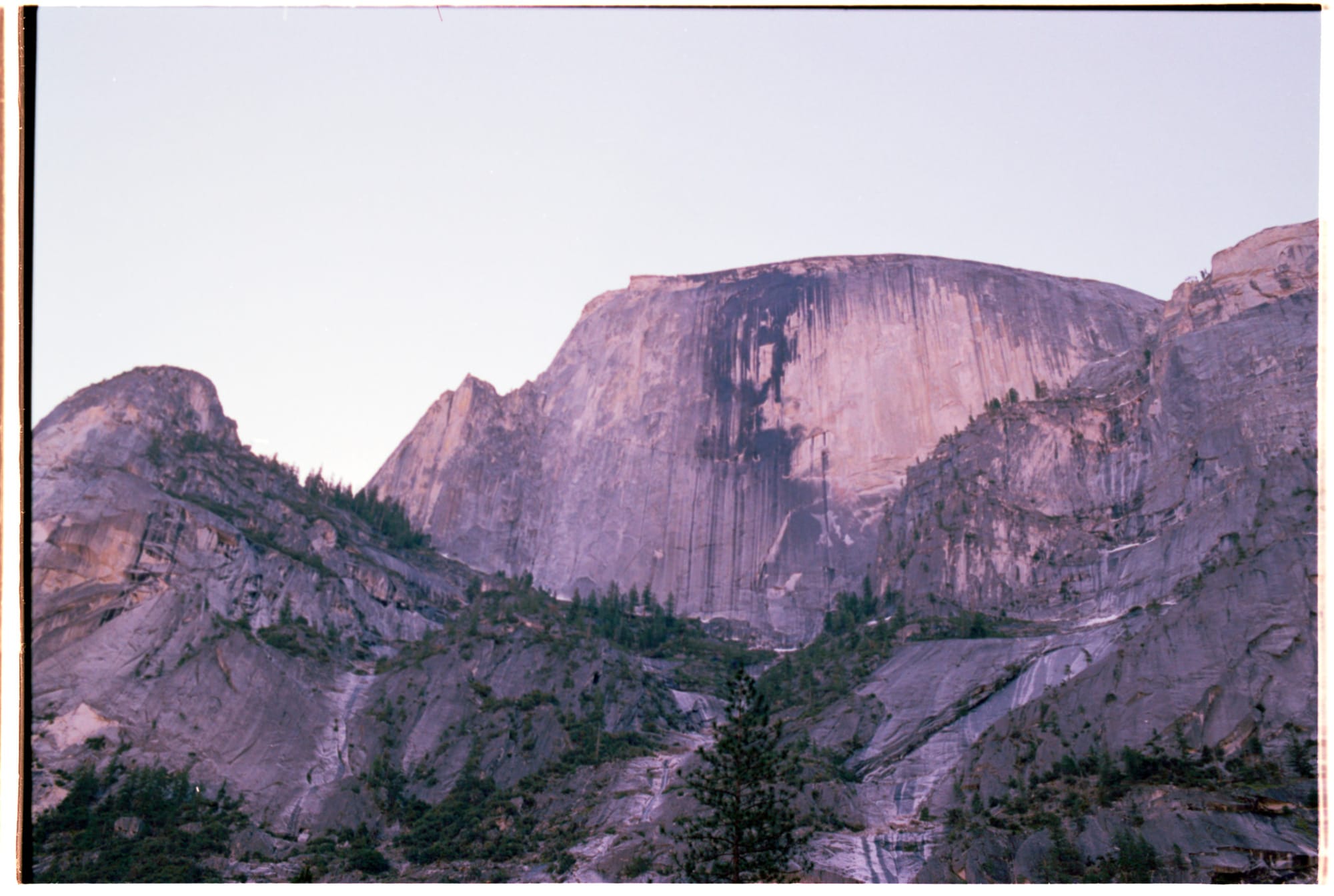 A film photo of Half Dome in Yosemite Valley, taken early morning